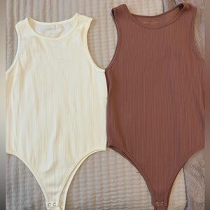 2 high neck ribbed bodysuit. Size S/M. SO soft & cute! Never worn. $14 for both!